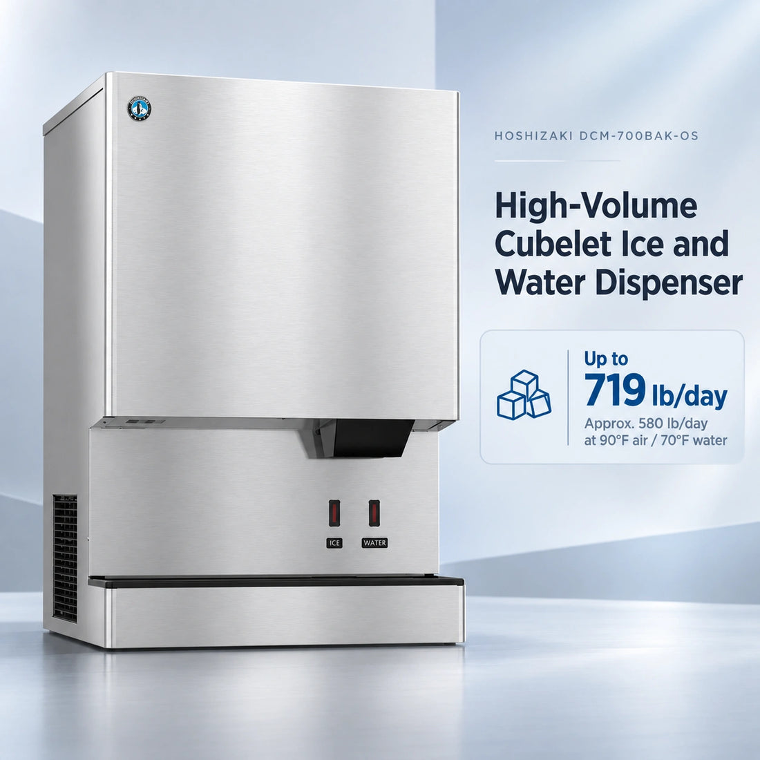A stainless steel commercial ice machine with a brushed metal finish, featuring a black drip tray, two red power switches labeled ON and OFF, and a small circular blue logo badge near the top left corner.