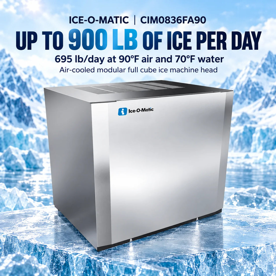 An Ice-O-Matic commercial ice machine with a brushed stainless steel exterior, a black top vented panel, and a blue and white logo on the front left side, shown on a plain white background.