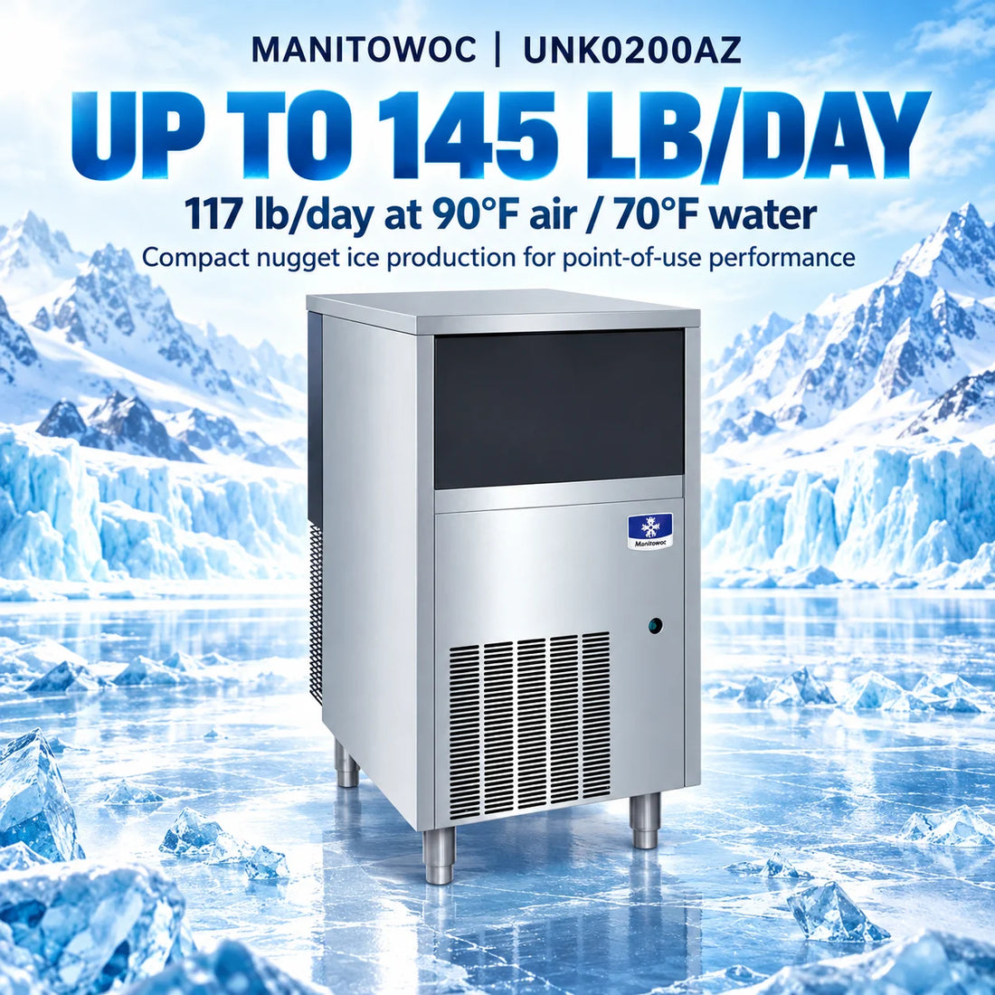 A stainless steel commercial ice machine with a dark front panel, vented lower section, and a small blue-and-white logo badge on the upper right front.