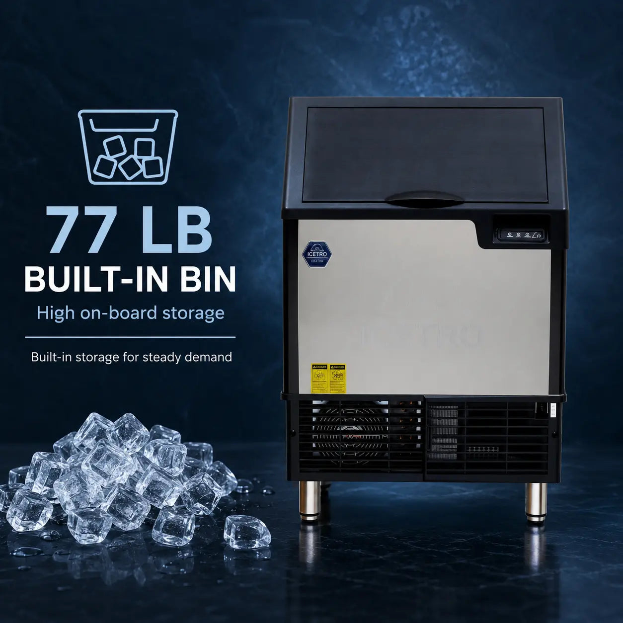 A commercial ice machine with a black and stainless steel body, shown on a dark blue reflective surface with a pile of clear ice cubes in the foreground. White text on the left reads '77 LB BUILT-IN BIN High on-board storage'.