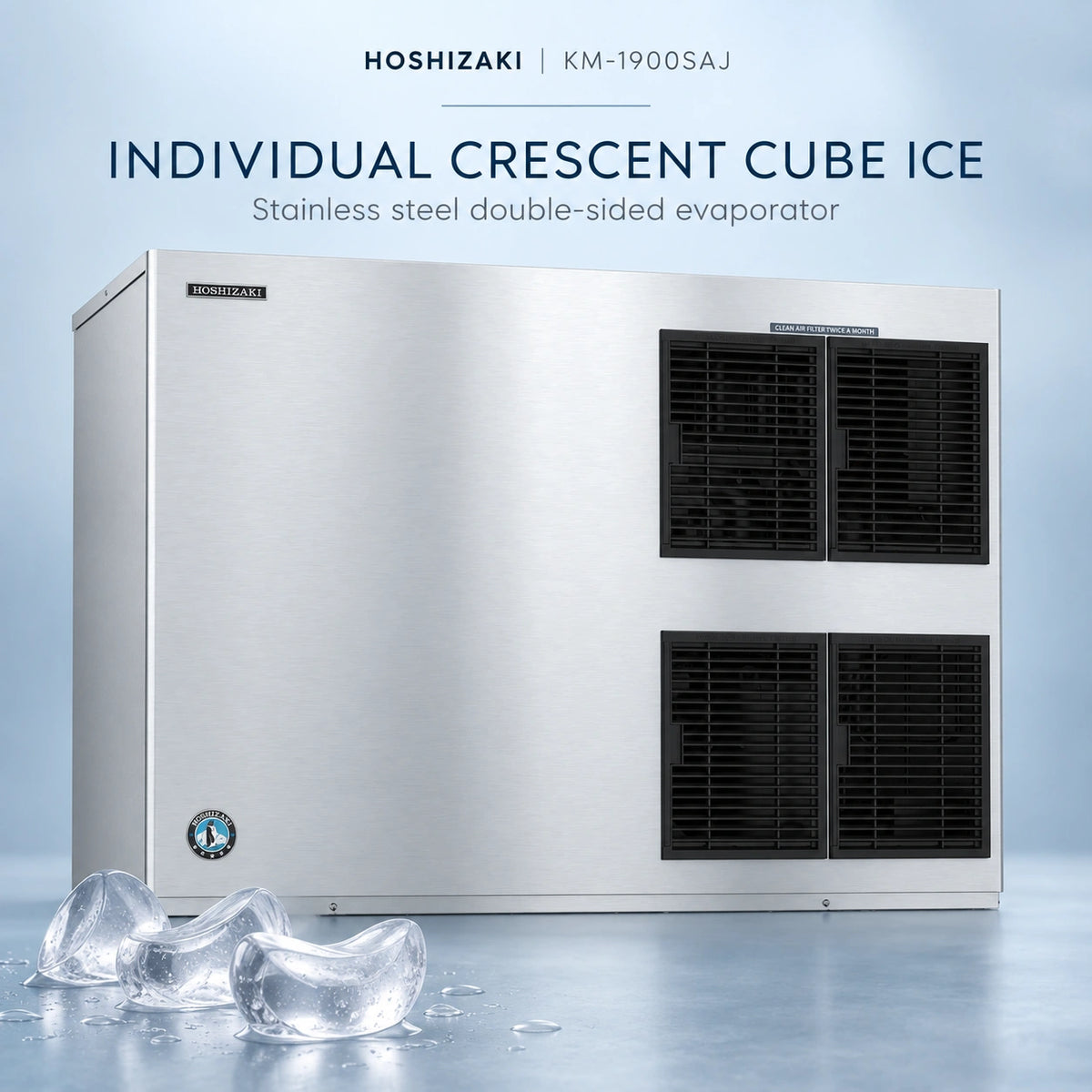 Hoshizaki KM-1900SAJ stainless steel double-sided evaporator ice machine with black vent grates, shown on a light blue background with ice cubes in the foreground and product text at the top.