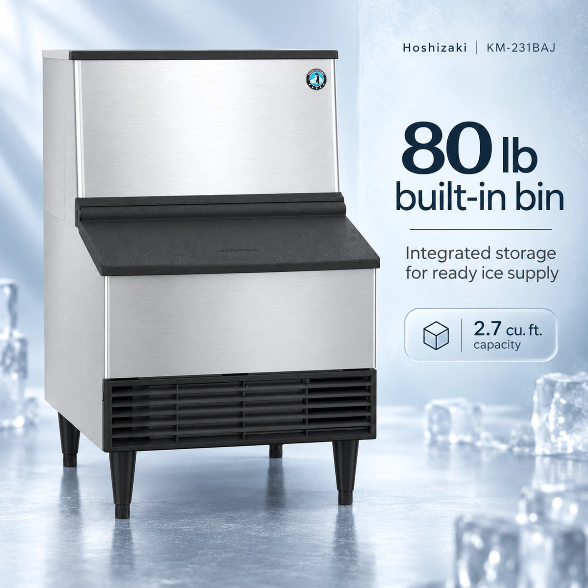 Hoshizaki KM-2318AJ 80 lb built-in bin ice machine in stainless steel with black trim and legs, shown on a cool blue studio background with ice cubes and product feature text.