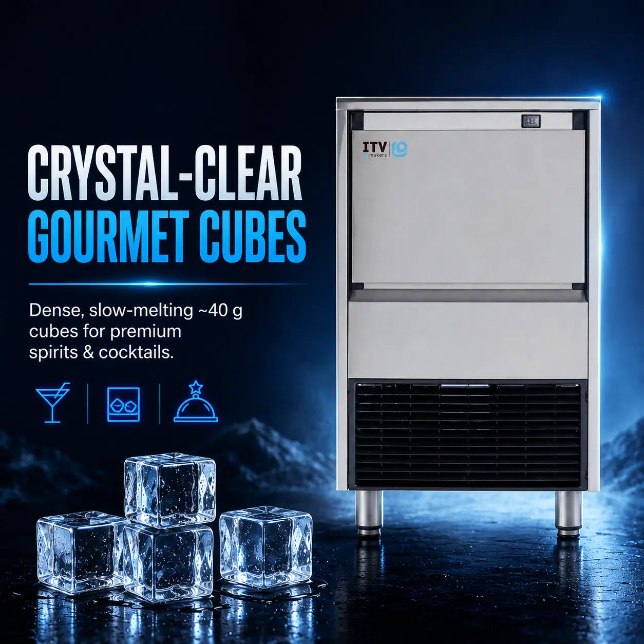 A commercial ice machine with a stainless steel and black front panel stands on a dark reflective surface. Several clear ice cubes are placed in front, and promotional text reads 'CRYSTAL-CLEAR GOURMET CUBES' with smaller copy about dense, slow-melting cubes for premium spirits and cocktails.