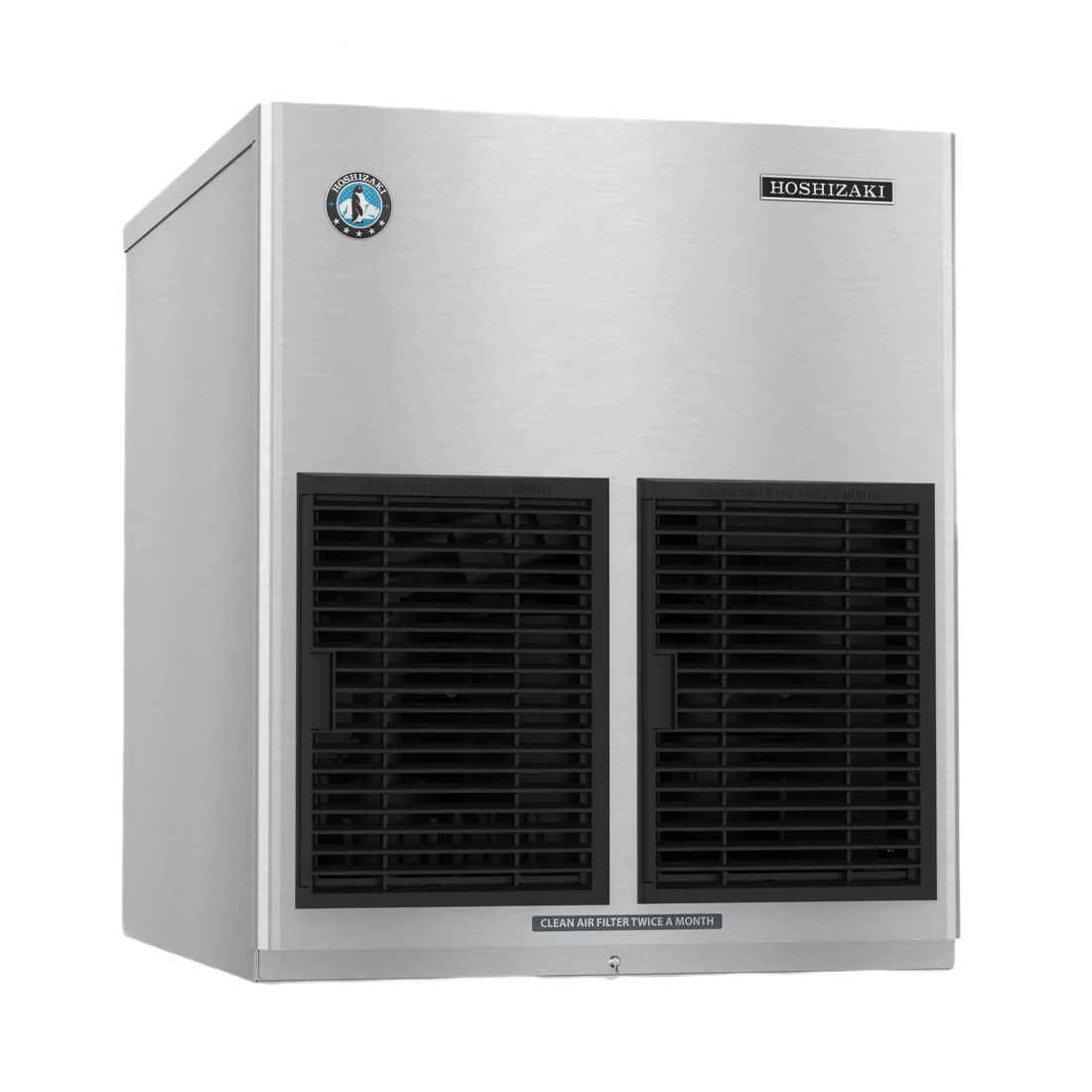 A Hoshizaki commercial ice machine with a brushed stainless steel exterior, two large black front ventilation grilles, and a small circular blue and white logo badge on the upper left front panel.