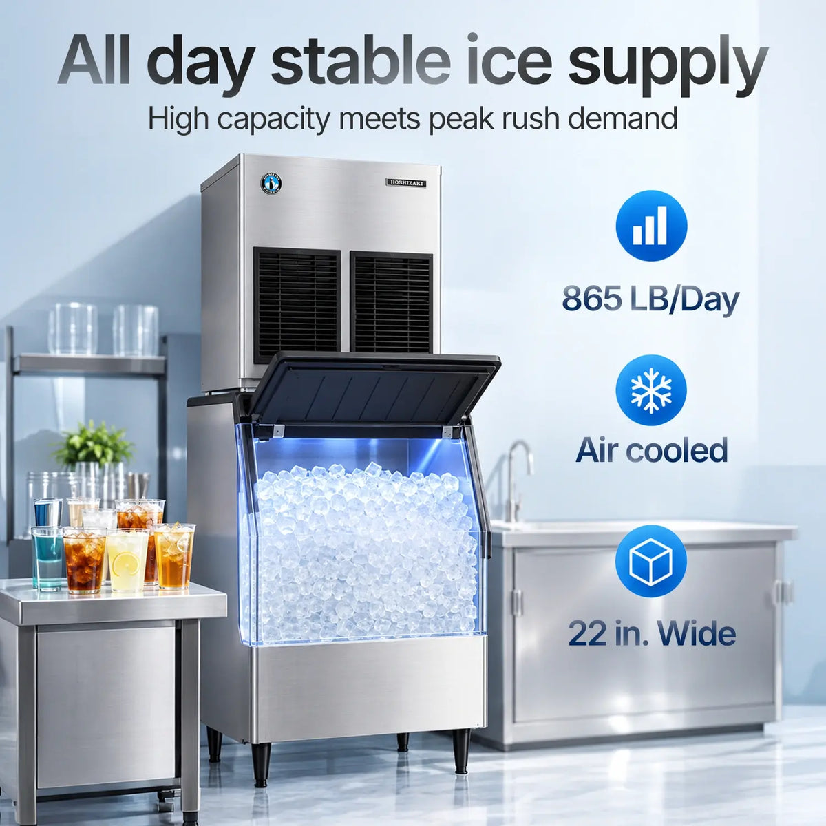 A stainless steel commercial ice machine with its door open, filled with ice, shown in a bright kitchen-like setting with text callouts reading 'All day stable ice supply,' '865 LB/Day,' 'Air cooled,' and '22 in. Wide.