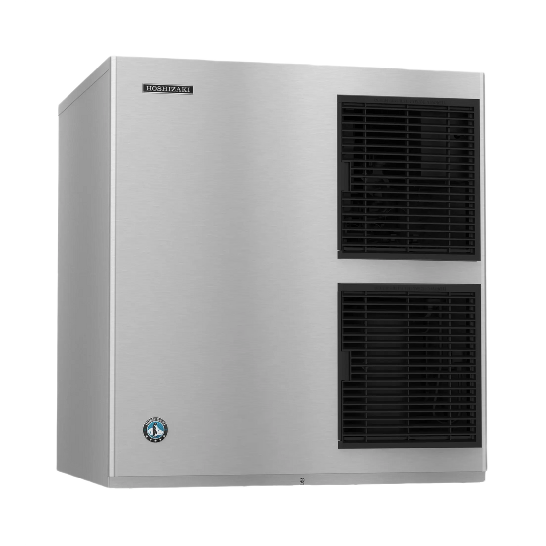 A stainless steel commercial ice machine with two black front ventilation grates and a small Hombiante logo on the upper left front panel, shown on a plain white background.