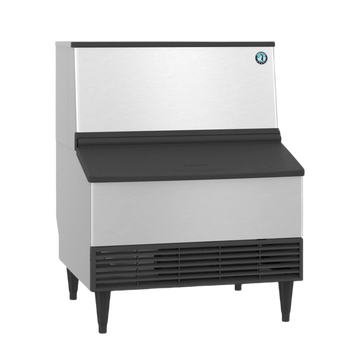 A commercial ice machine with a brushed stainless steel body, black top and front apron, black legs, and a vented black base grille, shown on a plain white background.