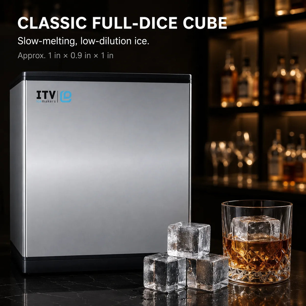 A silver and black countertop ice cube maker shown next to three ice cubes and a glass of whiskey on a dark bar counter, with a blurred bar shelf background and product text overlay.