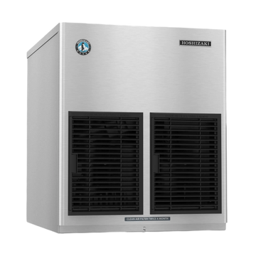 A Hoshizaki commercial ice machine with a brushed stainless steel exterior, two large black front ventilation grilles, and a small circular logo badge on the upper left side.