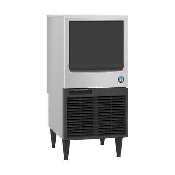 A commercial ice machine with a white upper cabinet, dark gray front window, black lower grille, and black legs, shown on a plain white background.